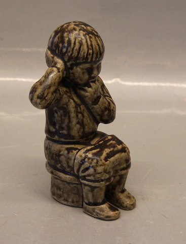 Royal Copenhagen Art Pottery 5395 Boy sitting 15 cm Signed JH for Johannes Hedegaard