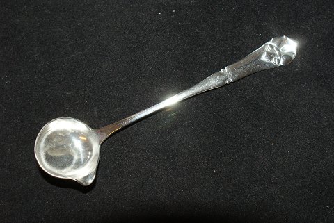 Cream spoon French lily silverLength 12.5 cm.