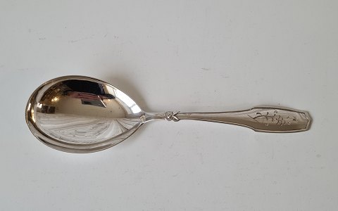 Mimi serving spoon in silver 21 cm.