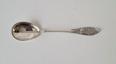 1800s silver jam spoon decorated with cereal