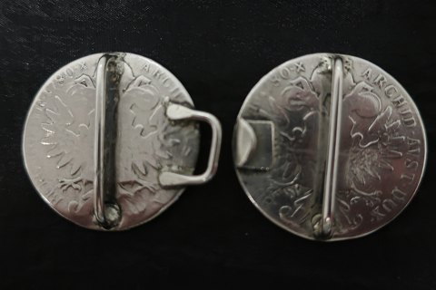 Buckle for the belt - made of silverMade of 2 coins from Austria / ÖsterreichText at the front:R-IMP-HU-BO-REG-M.THERESIA(Mother Theresia of Habsburg)Below is written: S.F.The back:With the eagle and the text: BURG-CO-TYR-1780-X-ARCHID-AVST-