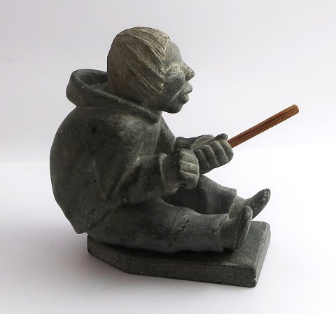 Greenland. Soapstone figure. Seated man. Height 12.5 cm. Something is missing in one hand. (Probably KarlK). Provenance Sorgenfri Castle (Prince Knud)