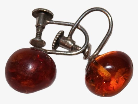 Amber ear screws