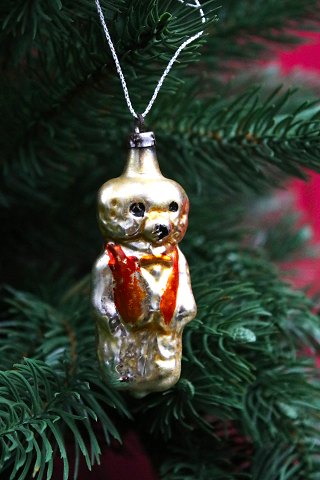 Old glass Christmas tree decoration in the form of a small teddy bear in gold 
from the 50s...