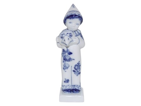 Blue Flower Ffgurine
Boy holding a mask