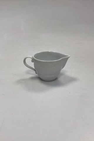 Royal Copenhagen Hvid Magnolia med uglaseret relief Flødekande No. 394