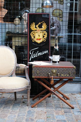 Exclusive coffee table / side table in the shape of an original vintage LOUIS 
VUITTON Monogram LV travel suitcase...