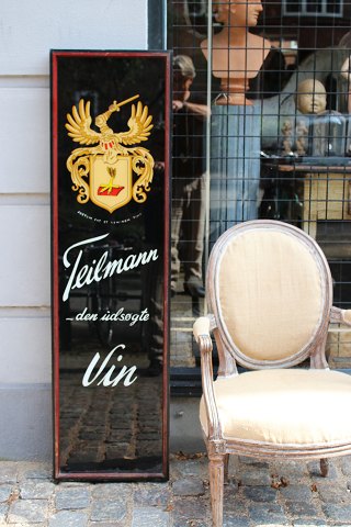Decorative, old advertising sign (Teilmann wine) painted on glass in a wooden 
frame...