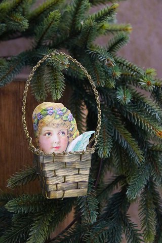 Old Christmas tree ornament in the shape of a small braided basket in brass from 
around 1950...