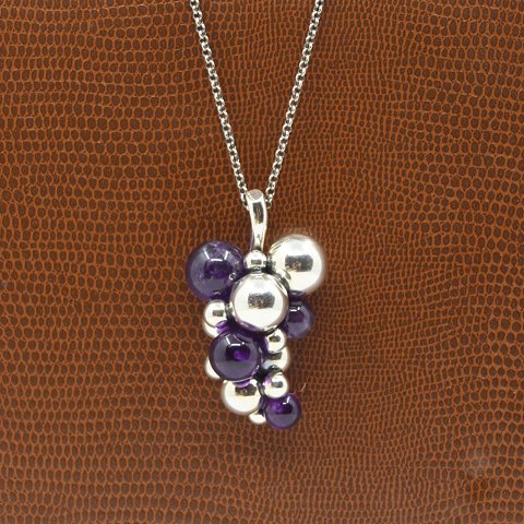 Georg Jensen; A Moonlight Grapes necklace of sterling silver with amethyst