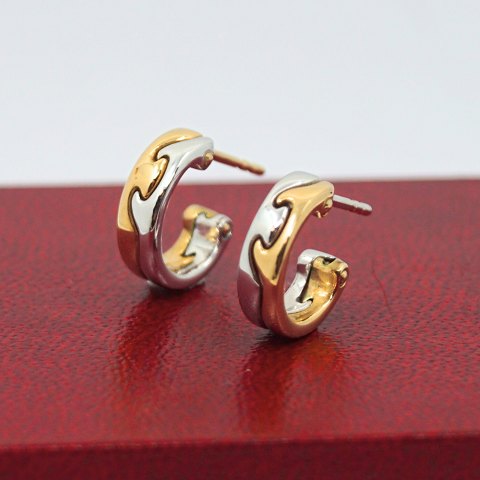 Georg Jensen, Nina Koppel; Pair of fusion earrings of 18k gold and white gold