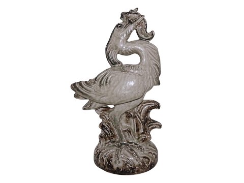 Stor og sjælden Royal Copenhagen keramik figurHejre fanger fisk af Knud Kyhn