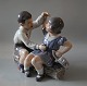 Dahl Jensen figurine
1214 Boy & Girl with ship (DJ) 20.5 cm