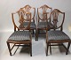 A set of four hepplewhite dining room chairs in polished mahogany and Black fabric. The chairs are from England and the 1920s. 5000m2 showroom.