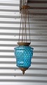 Blå glas ampel.