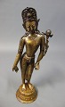 Indian figure in patinated gilded metal, signed AS4R330.5000m2 showroom.