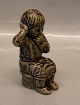 Royal Copenhagen Art Pottery 5395 Boy sitting 15 cm Signed JH for Johannes Hedegaard
