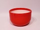 Red glass bowl with white opaline glass on the inside from the series Palet designed by Michael Bang for Holmegaard.5000m2 showroom.