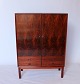 Large cabinet in rosewood of danish design and manufactured by Brouer in the 1960s.5000m2 showroom.
