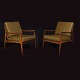 Ole Wanscher for France & Daverkosen: A pair of lounge chairs. Rosewood. H: 78 / 
43cm. W: 66cm