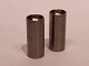 A pair of salt and pepper shakers in stainless steel by Stelton.5000m2 showroom.