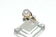 Ring ladies with white pearl 14 carat gold
Size 55