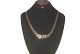 Antik Huset 
presents: 
X with rod 
necklace 14 
carat gold and 
course