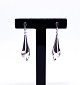 A pair of earrings of 925 sterling silver.5000m2 showroom.