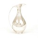 A Sterlingsilver pitcher designed by Kay Fisker for A. Michelsen, Copenhagen. Signed and dated 1975. H: 24cm. W: 642gr