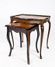 Nesting tables of dark wood with inlaid wood, in great antique condition from the 1960s. 5000m2 showroom