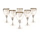 A set of 6 sterlingsilver wine goblets by Harald Nielsen for Georg Jensen. 
#532A. H: 12,5cm. W: 766gr