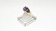 Lady ring with purple stone 14 carat gold
Size 55