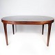 Dining table in rosewood with extension of danish design from the 1960s.5000m2 showroom.
