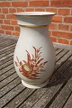 Royal Copenhagen Danish crackle porcelain with 
gold rim. Large vase with flower decoration 
24.5cm