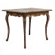 Mid 18th century Rococo table, black painted. Table with cabriole legs and gilt 
cuts. Sweden circa 1760. H: 77cm. Top: 72x103cm