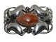 Henry Andersen 
Danish Art Nouveau silver brooch with  amber 
1933-1950.