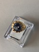 14 Karat gold ring with inlaid light blue stone, 
Size 56