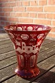 Bohemian glass. Ruby red vase with cuttings and nice decoration