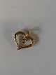 Heart Pendant with a Diamond in 14 carat gold.