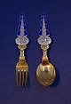 Michelsen set Christmas spoon and fork 1927 of 
Danish gilt silver