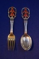 Michelsen set Christmas spoon and fork 1928 of 
Danish gilt sterling silver