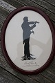 Silhouette felt-tip drawing of violinist Carl 
Flesch in oval mahogany frame