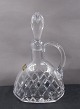 Carafe of crystal with grindings and the original 
stopper 24cm