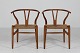 Hans J. WegnerWishbone chairs CH 24 of oak with patina