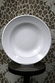 Royal Copenhagen deep plate in white hotel porcelain / iron porcelain.
Dia.: 23.5cm...
