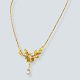 Jean Larsen; A necklace of 18k gold set with pearls