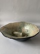 Ceramic Retro bowl-dish, in brownish and green shades.
Ø: 29.5 x 8 cm.