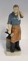 Royal Copenhagen. Blacksmith. Model 4502. Height 23 cm. (1 quality)