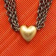 Ole Lynggaard, Heart clasp of 14k gold, with oxidized silver chain