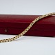 A tennis 
bracelet in 18k 
gold set with 
diamonds